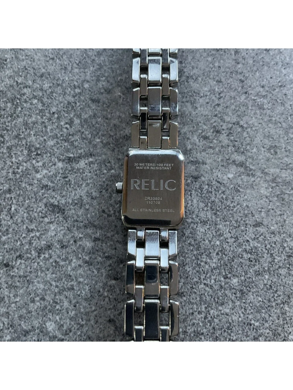 Relic Womens Tank Style Watch ZR33804 17mm Silver Tone Case & Band Black Dial BW